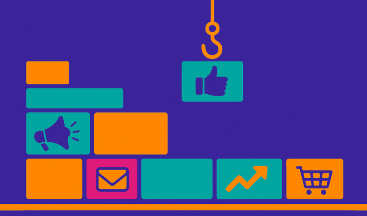 Bricks with marketing icons building the foundation of your marketing plan.